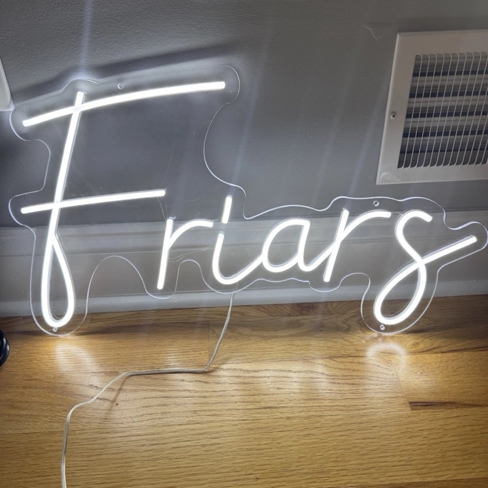 White Neon 'Friars' Sign